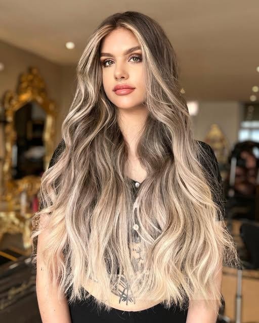 Blonde colour and waves created at LabellaSallon